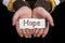 Hope text on hand