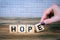 Hope. Wooden letters on the office desk