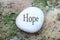 Hope, words printed on white stone