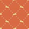 Hopping bunnies seamless pattern on orange background