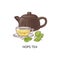 Hops tea - cup and teapot with healthy yellow herbal drink from hop and humulus plant