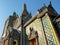 Hor Phra Gandhararat chapel building exterior details with mosaic tiles by Wat Phra Kaew temple of Grand Palace complex in Bangkok