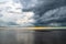 Horizon's Embrace: A Panoramic Cloudscape Over the Ocean