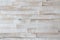 Horizontal background of rustic white wood with faded paint and panel structure