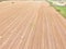 Horizontal bale hays on corn farm after harvest in Hill Country, Texas, US