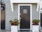 Horizontal of black front door to family home