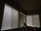 Horizontal blinds sunlight pattern window