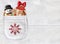 Horizontal Christmas backdrop with gifts in pocket on suede texture of ivory color. Xmas background with toys and gift box in