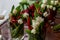 Horizontal closeup photo of several bouquets of white tulips