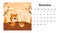Horizontal desktop calendar page template for November 2022 with a cartoon Chinese year symbol. The week starts on