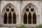 Horizontal detail shot of gothic arches from the cloister garden of the Poblet Monastery, Tarragona, Spain,