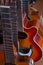 Horizontal high angle view of electric guitar, banjo, spanish guitar and acoustic guitar.