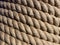 Horizontal linen rope yarn stripe texture. Long string strap pattern