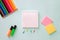 Horizontal minimalistic close-up flat lay composition with Clear sheet note book, stationery stickers pink and lemon color, paper