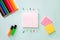 Horizontal minimalistic close-up flat lay composition with Clear sheet note book, stationery stickers pink and lemon color, paper