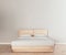 Horizontal mock up poster frame in modern interior background, natural light wood bed frame with clean bedding in white bedroom