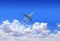 Horizontal nature background with aircraft and Jet trailing smoke in the sky. Airplane and condensation trail