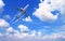 Horizontal nature background with aircraft and Jet trailing smoke in the sky. Airplane and condensation trail