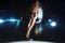 Horizontal photo of slim blonde ballerina on stage