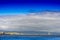 Horizontal pier with lighthouse and bird landscape background