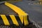 Horizontal road marking lanes. highway concrete barriers on the road. vehicle collision lane separator. yellow color with black st