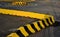 Horizontal road marking lanes. highway concrete barriers on the road. vehicle collision lane separator. yellow color with black st