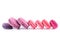 Horizontal row on a white background of different pink macaroni cookies