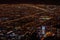 Horizontal shot of the city of Bogota at dusk from Monserrate, with night lights and the Colpatria skyscraper on the lower side of