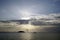 Horizontal shot. Empty beach in the evening at sunset. . Silhouettes and coastline. Sea bright sky. Greece Sithonia. Horizon.