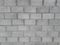 Horizontal shot of a gray bricked wall at a construction site