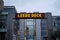 horizontal shot of a Leeds dock sign lite up