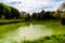 Horizontal shot of the Porto City Park in Portugal. Green river between the tre