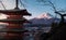 Horizontal shot of the red Chureito Pagoda in Japan, with Fujiyama Mount Fuji in the background