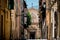 Horizontal shot of a rural neighborhood street on a sunny day in Menton, Cote d\\\'Azur, France