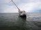 Horizontal shot of a sailboat on a sandbank on Wangerooge island, located in northern Germany