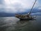 Horizontal shot of a sailboat on a sandbank on Wangerooge island, located in northern Germany