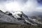 Horizontal shot of snow filled rocky mountains of Iztaccihuatl - Popocatepetl National Park in Mexico