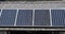 Horizontal shot of solar panels on the roof