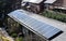 Horizontal shot of solar panels on the tile roof