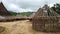 Horizontal shot of Tairona huts on the trail to the \\\