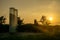 A horizontal sunrise image of the September 11 Memorial at Cos Cob Park