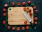 Horizontal top view of red tomatoes lying around wooden chopping board. Green parsley and dill. Knife near. Vegan table. Food