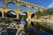 Horizontal view of famous Pont du Gard, old roman aqueduct in France