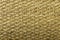 Horizontal view of hand made original brown colored wicker weave texture