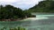 Horizontal view of tropical island with kayak, Therese Island, Mahe, Seychelles.