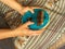 Horizontal view of a young caucasian man playing an African Kalimba. Traditional music concept