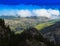 Horizontal vivid cloudscape in high altitude mountains