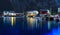 Horizontal vivid evening in Norway town with light reflections