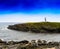 Horizontal vivid Norway right aligned lighthouse  on island land