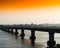 Horizontal vivid orange sunset indian bridge